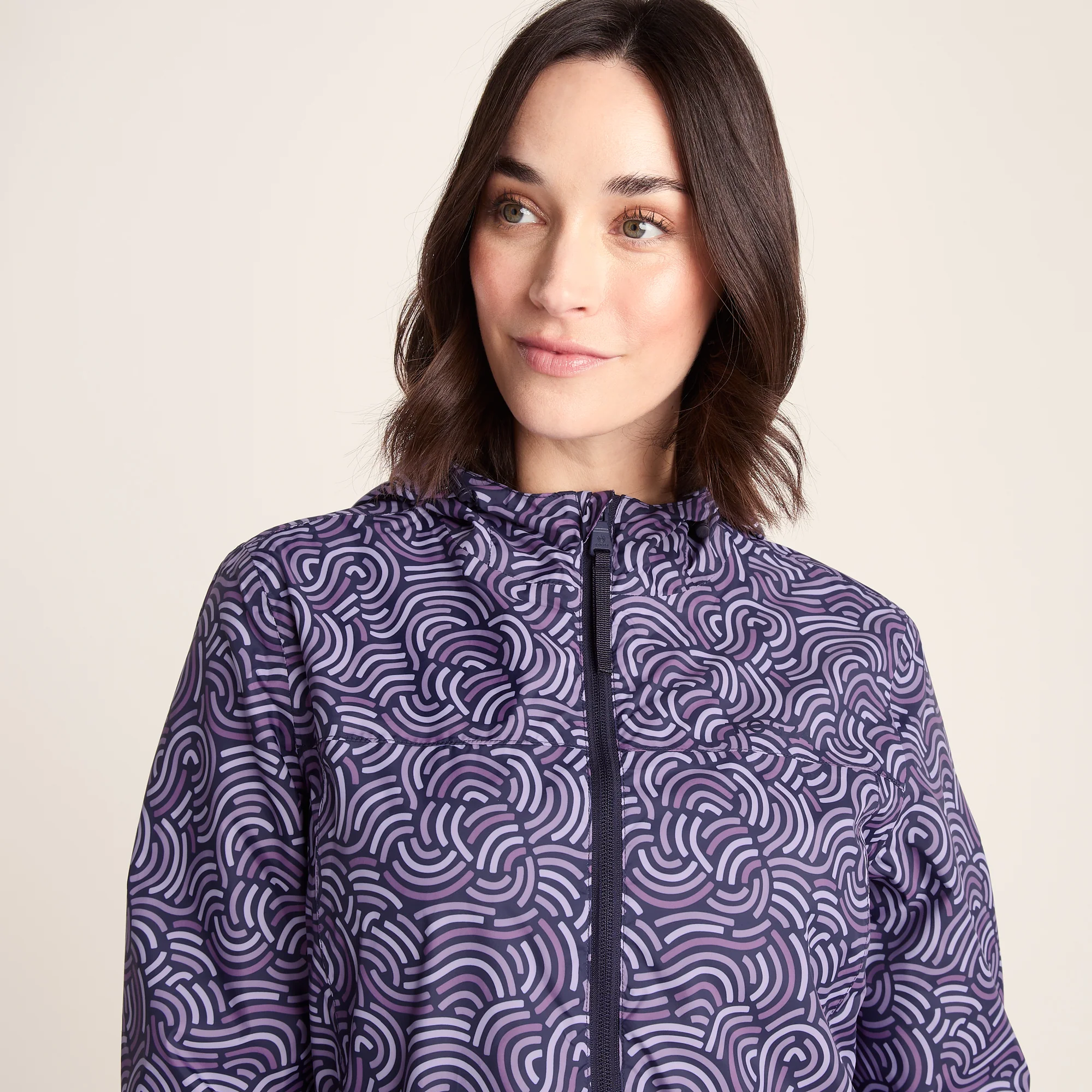 Craven Womens Waterproof Packaway Jacket - Dk Indigo/Lilac Blossom Wave Print - Image 5